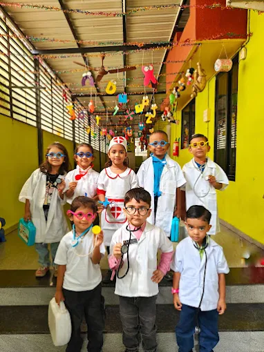 Children dressed up as little doctors at Little Paradise Pre-School