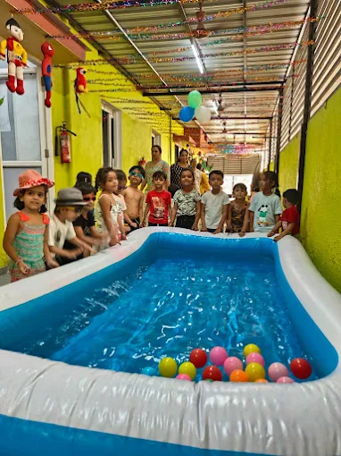 Children enjoying a pool party at Little Paradise Pre-School